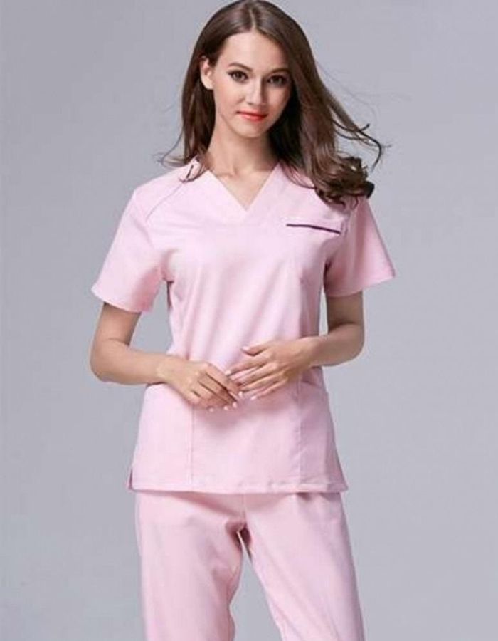 Đồng phục áo, quần màu hồng cho nữ nhân viên
