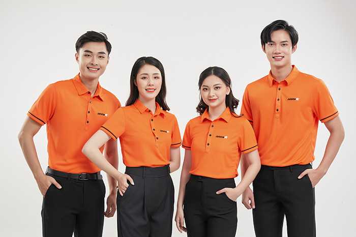 Mẫu áo polo màu cam đồng phục công ty nổi bật
