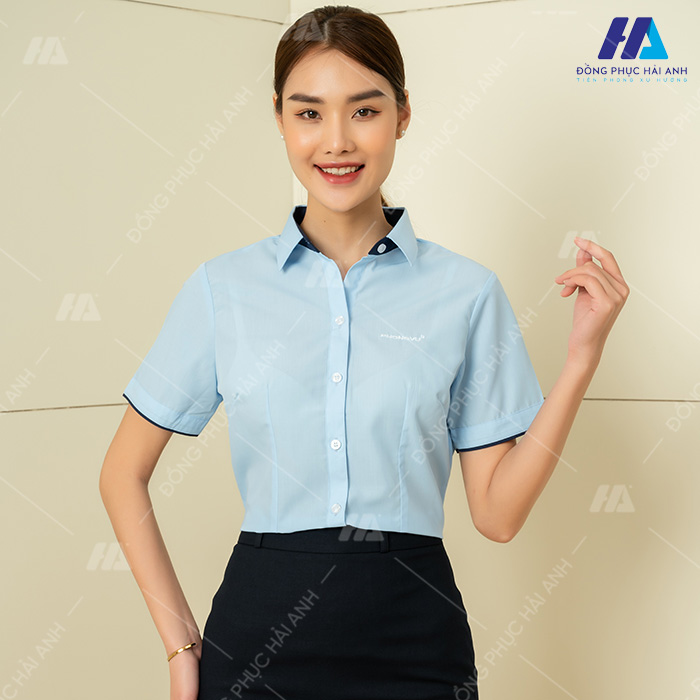 Mẫu áo sơ mi xanh dương thanh lịch dành cho nữ nhân viên công sở
