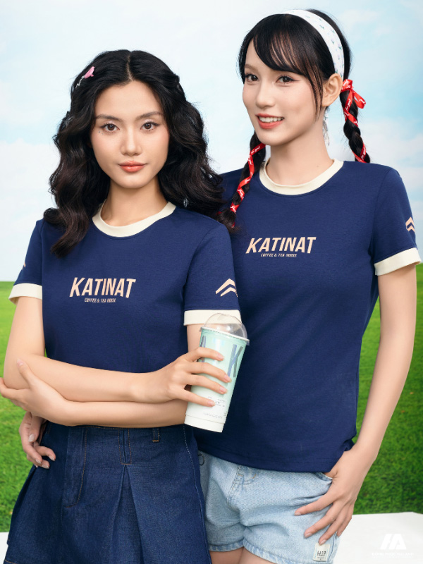 áo đồng phục công ty ultimate cổ tròn màu xanh đen phối màu kem chesse